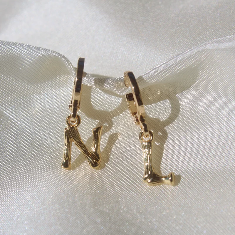 women's tanzanite earrings-Mini Bamboo Letter Huggies